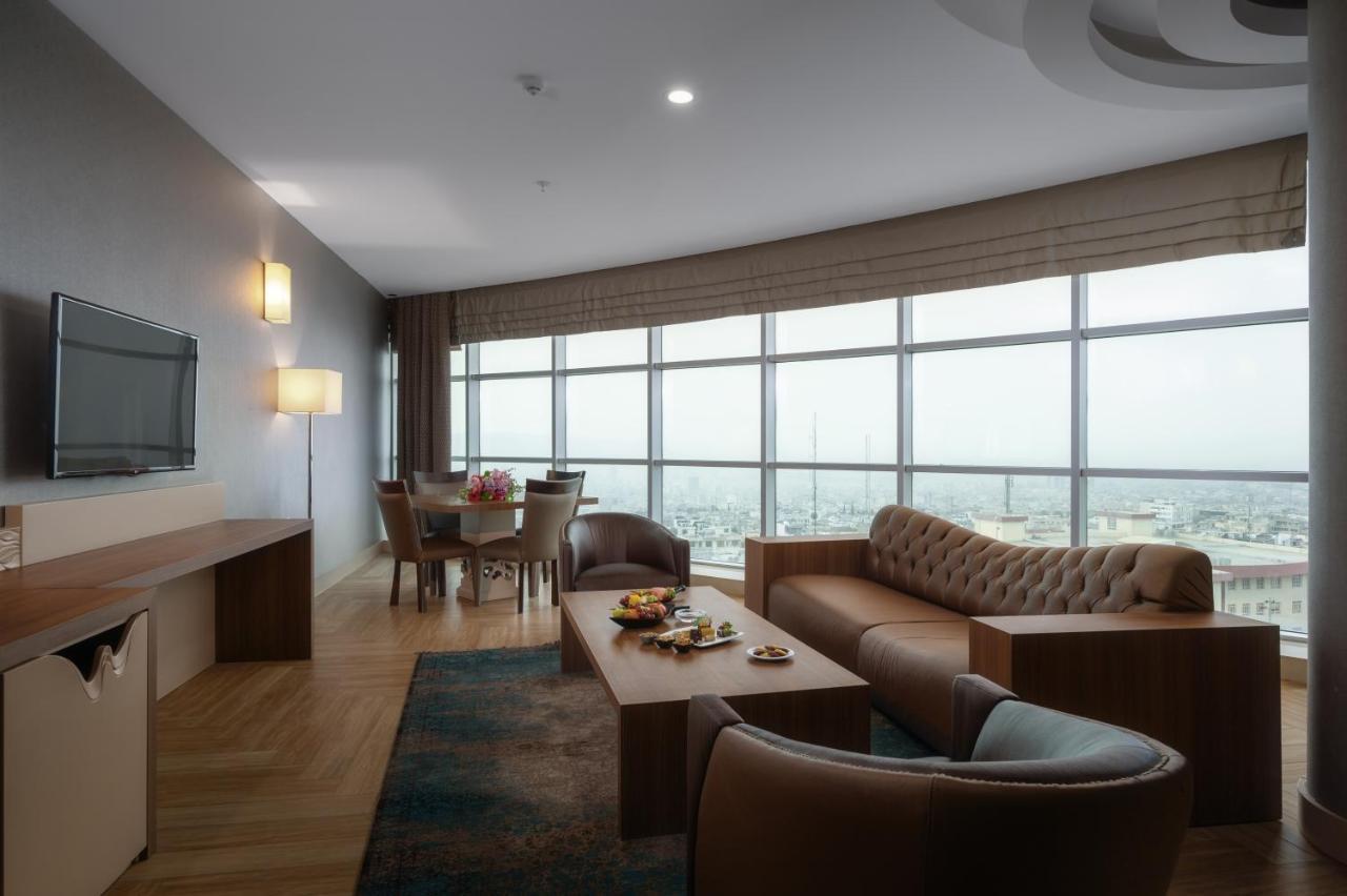 Titanic Hotel & Spa Sulaymaniyah Εξωτερικό φωτογραφία A living room in a suite at the hotel